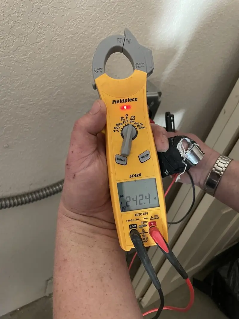 Voltage testing with clamp meter during Generator Installation in Baltimore